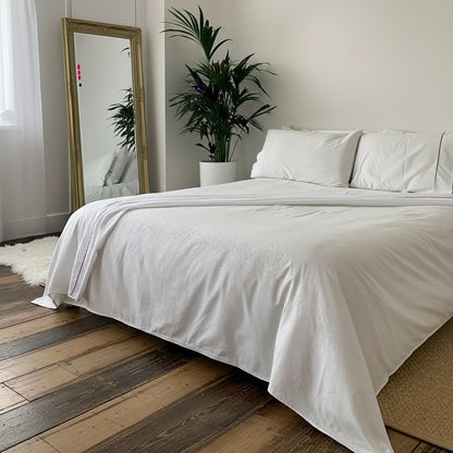 Sábanas Floréa Blanco sobre cama SOFT NATURE